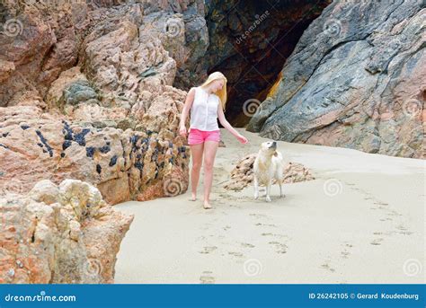 Blond Girl Walking with Dog on the Beach Stock Image - Image of blondy, classy: 26242105