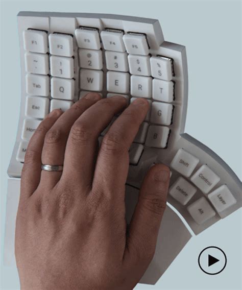 split ergonomic keyboard supports natural finger and thumb movement