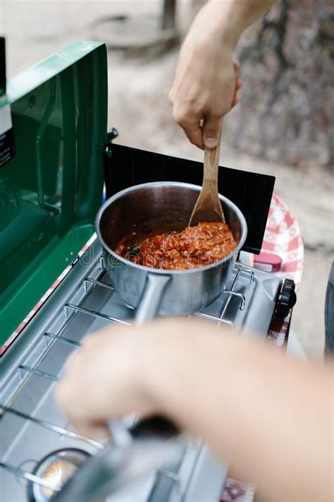 Man Cooking Chili on a Camp Stove in the Woods Stock Image - Image of stove, bowl: 262363017