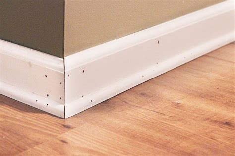 The Beginner's Guide to Patching and Painting Baseboards | Painting baseboards, Baseboards ...