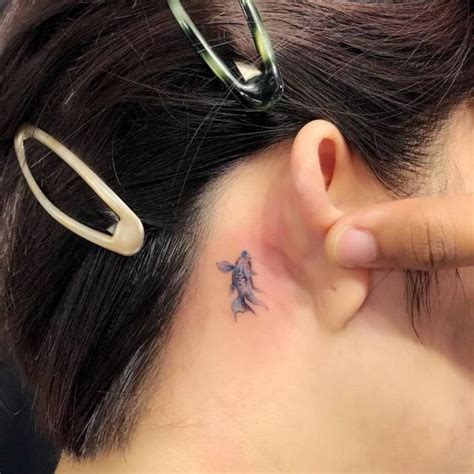 fish-behind-the-ear-tattoo | girlterestmag