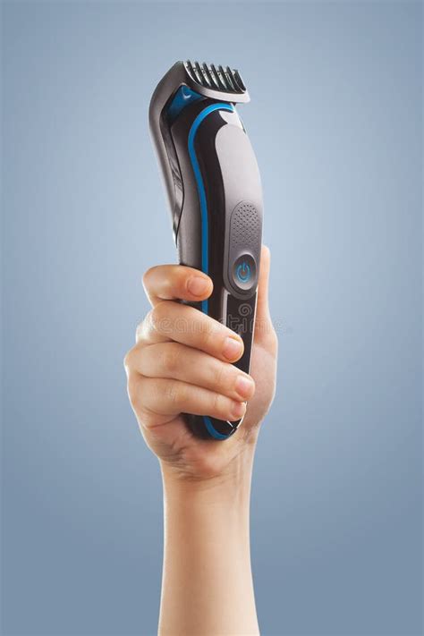 610 Hand Holding Hair Clipper Stock Photos - Free & Royalty-Free Stock ...