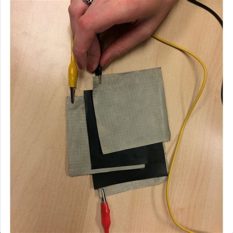 | Six alternating layers of conductive fabric and Velostat to build a... | Download Scientific ...