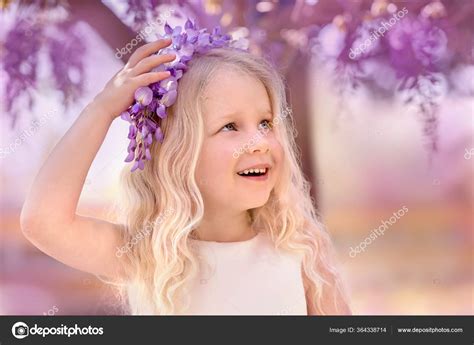 Little Girl Wisteria Blossom Easter Background Stock Photo by ©g215 364338714