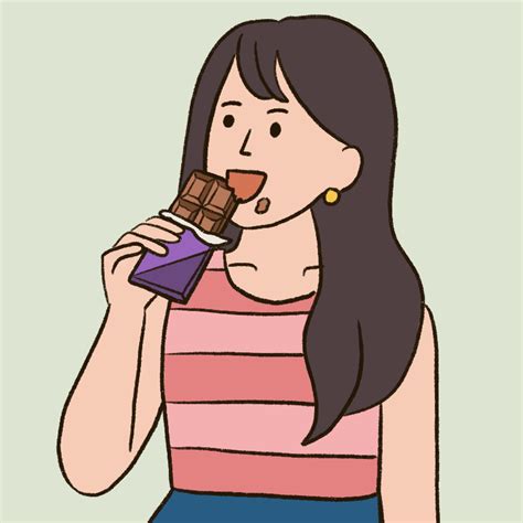 a woman eating a chocolate bar while wearing a striped shirt