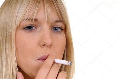 Woman smoking a cigarette Stock Photo by ©luna123 3826950