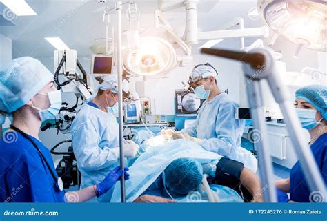 Spinal Surgery. Group of Surgeons in Operating Room with Surgery Equipment Stock Photo - Image ...