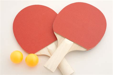Free Stock Photo 11970 Two table tennis bats and balls | freeimageslive
