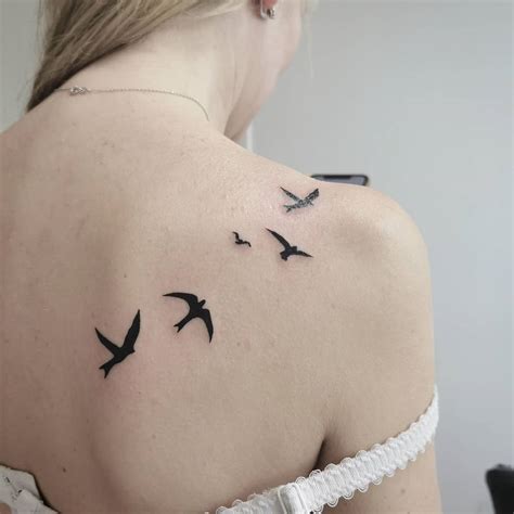 Share 75+ flying birds tattoo meaning best - in.coedo.com.vn