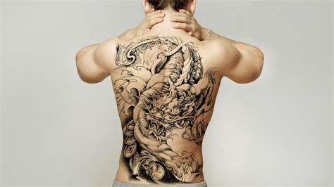 20 Cool Back Tattoos for Men in 2024 - The Trend Spotter