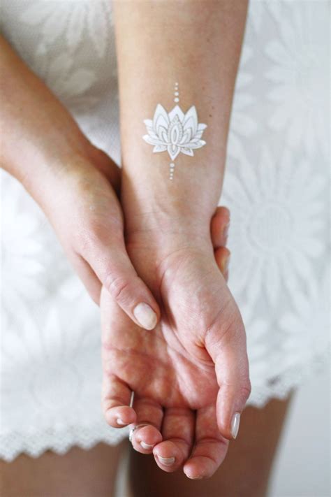 Silver and white lotus temporary tattoos | Products | Lotus tattoo, Tattoos, Flower tattoo designs