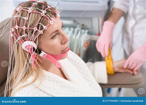 Diagnostician Prepares the Patient for Electroencephalogram Procedure ...