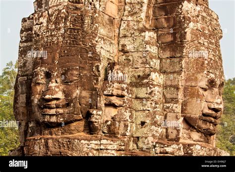 Stone faces of Bayon Temple Stock Photo - Alamy