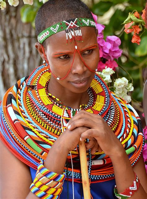 Massai girl adorning colourful and traditional dress. Sout… | Flickr