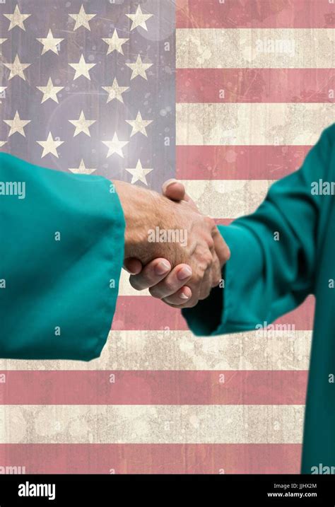 Handshake against american flag background Stock Photo - Alamy