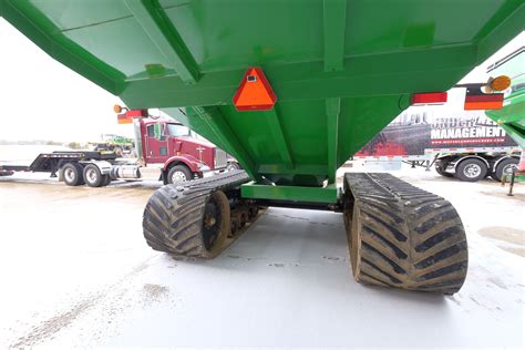 J & M Grain Cart (2013) - 1307261 - J & M 1501 grain storm track grain cart, 36" tracks, roll ta