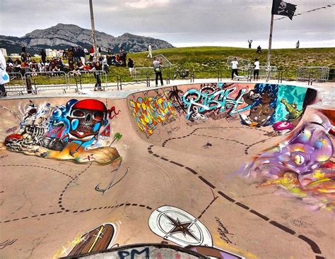 the skateboard park is full of colorful graffiti