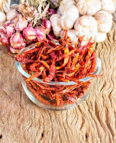 Dried hot red chillies stock image. Image of wooden, spicy - 66744759