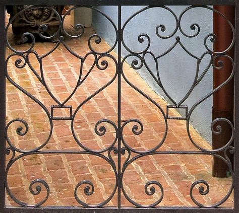 Wrought iron gate (detail): Rainbow Row, Charleston, SC | Flickr