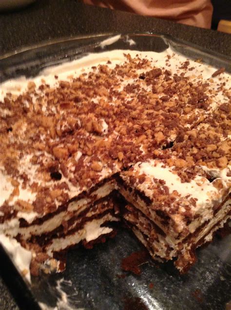 Heath Bar Crunch Ice Cream Cake -A layer of ice cream sandwiches -A layer of whipped cream -A ...