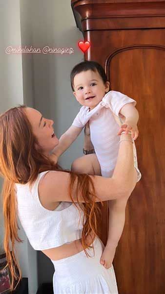 Lindsay Lohan looks elated as she poses with baby girl one month after surprise wedding | HELLO!