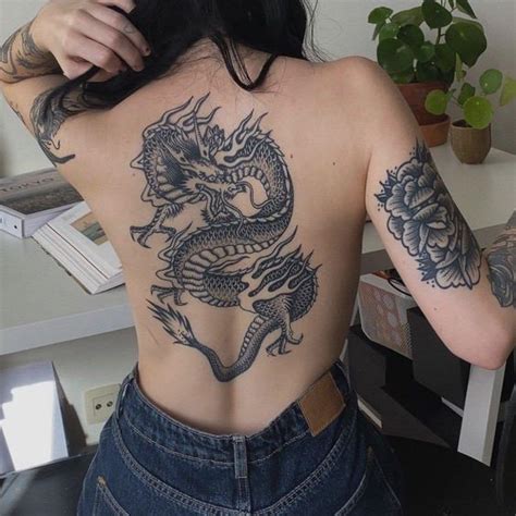 Dragon back tattoos in 15 images for men and women