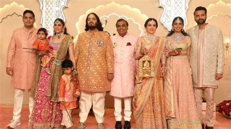 Anant Ambani’s peach-orange sherwani and elephant brooch - A wedding ...