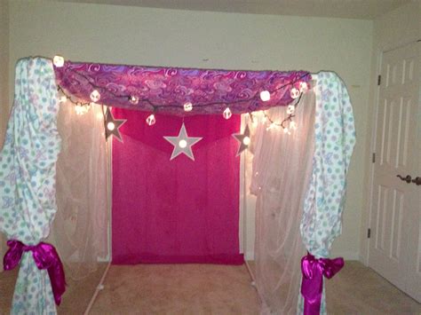 Party fort - PVC pipe, sheets and Christmas lights. Fun place for kids to hang out at a sleep ...