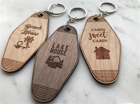 Hotel keychain cherry and walnut solid wood cabin beach and lake house laser cut and engraved ...