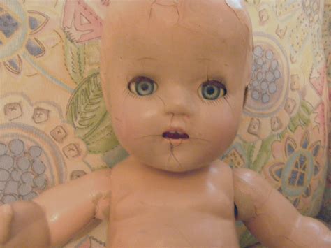 ANTIQUE CELULOID AND COMPOSITION BABY DOLL W/BLUE GLASS SLEEP EYES Sold ...