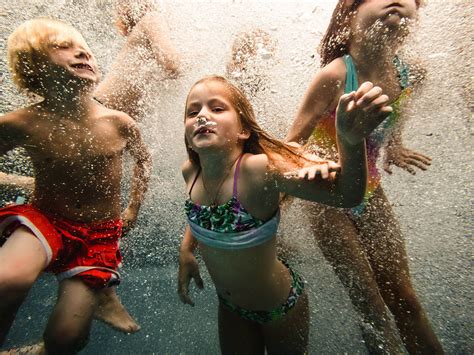 photo of kids swimming underwater by Samantha McBride - Click Magazine