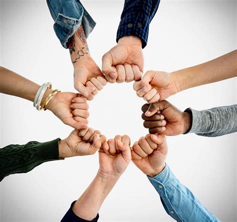 Group of people fist bump assemble together | Royalty free stock photo | High Resolution image