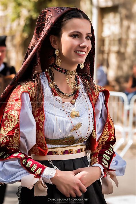 I believe this is a woman in traditional Sardinian costume, please correct me if I am wrong ...