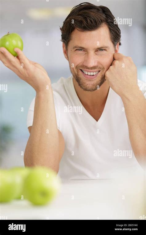 man with apple logo fruit Stock Photo - Alamy