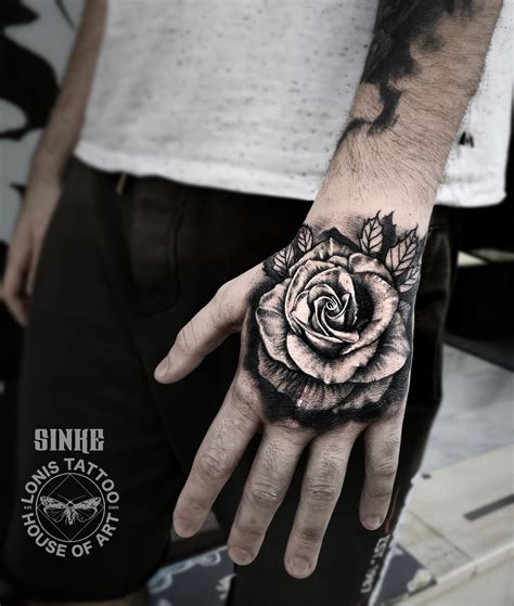 #fist tattoo #flower tattoo #rosetattoo #rose #tattoodesign #blackandgraytattoo #black and gray ...