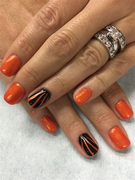 Make A Style Statement With Black And Orange Halloween Nails | The FSHN