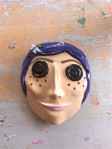 Ceramic Coraline doll mask | Clay mask art, Ceramic mask, Masks art