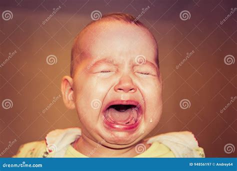 Portrait Of A Crying Baby. Tears On The Face Stock Image ...