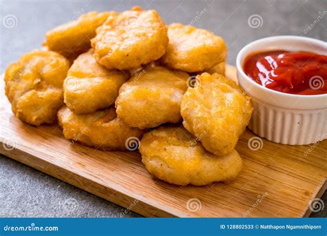 Chicken nuggets with sauce stock image. Image of tasty - 128802533