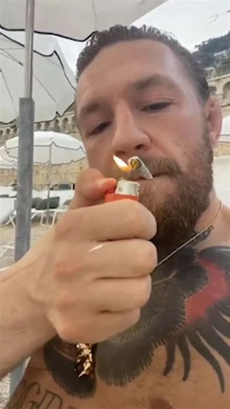 Conor McGregor smokes suspicious cigarette as UFC star relaxes on ...