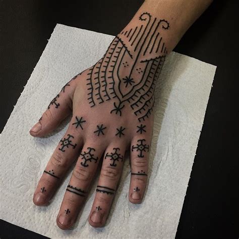 Cross and line tattoos on fingers - Tattoogrid.net