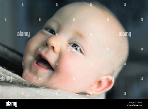 Close up of babys laughing face Stock Photo - Alamy