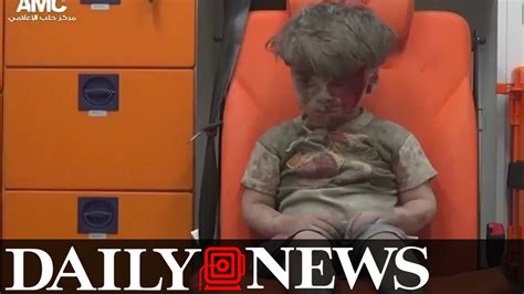 Bleeding, Soot Covered Syrian Boy Rescued From Airstrike Rubble - YouTube