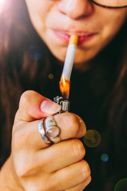 Best Lit Cigarette Stock Photos, Pictures & Royalty-Free Images - iStock