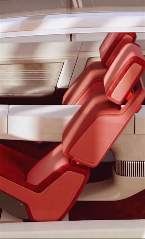 the interior of a car with red seats