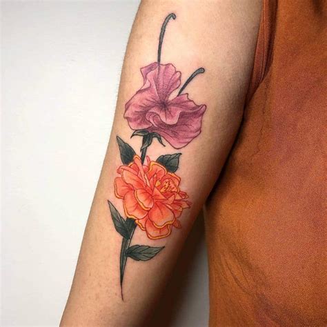 Aggregate 76+ marigold and rose tattoo - in.cdgdbentre