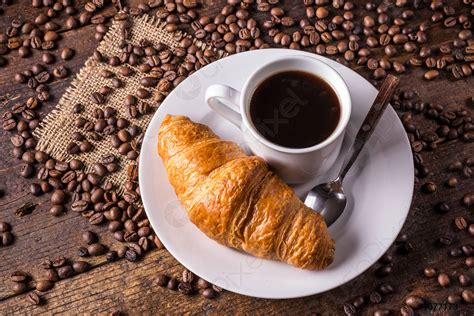 Coffee and croissant - stock photo | Crushpixel