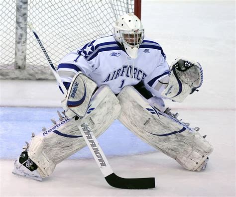 Free Photos: Ice hockey goalie in front of his net | peopleshot