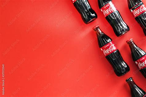 Moscow, Russia-July 9, 2020: Coca Cola in bottles on a red background ...