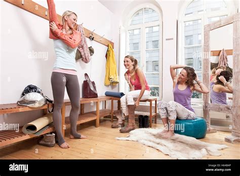 Group of women changing clothes in yoga studio changing room Stock Photo: 124257078 - Alamy